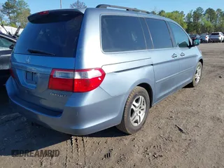 2005 Honda Odyssey EX-L with VIN 5FNRL38605B037065, listed as a IAAI auction lot 42042666 with 228,908 mi miles. Bid and sale history available at carsss.com. Image 4.