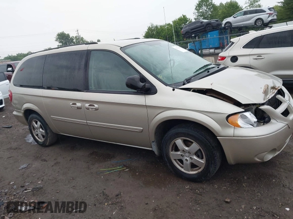 2005 Dodge Caravan SXT z VIN 2D4GP44L05R599391, wystawiony jako IAAI lot #42371619 z przebiegiem 116 468 mil mil oraz . Historia ofert i sprzedaży dostępna na DreamBid. Obrazek 13.