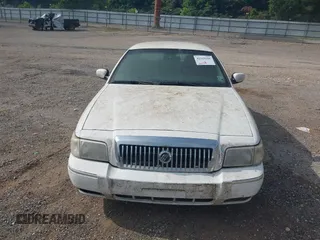 2006 Mercury Grand Marquis LS Premium z VIN 2MEFM75V96X649641, wystawiony jako IAAI lot #42315126 z przebiegiem 144 173 mil mil oraz . Historia ofert i sprzedaży dostępna na DreamBid. Obrazek 16.