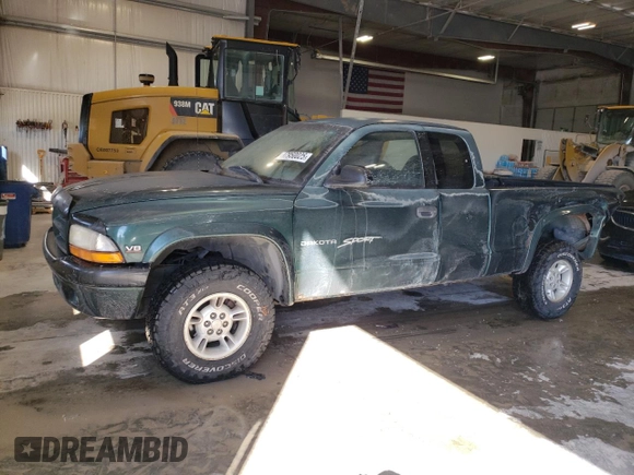 1999 Dodge Dakota SLT with VIN 1B7GG22Y9XS149398, listed as a Copart auction lot 47950025 with 173,413 mi miles and Salvage Title. Bid and sale history available at carsss.com. Image 1.