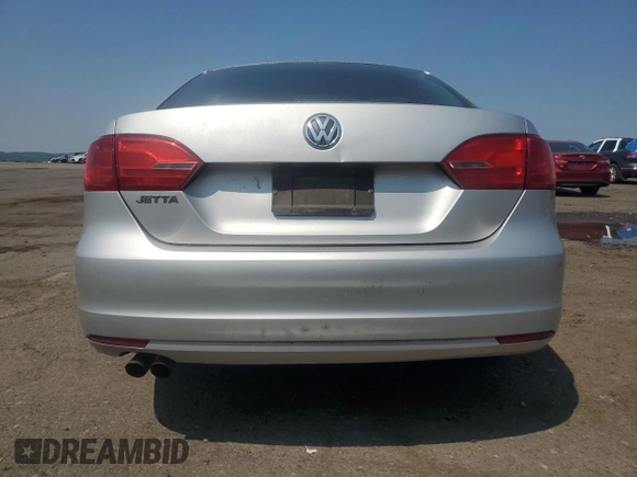 2012 Volkswagen Jetta S with VIN 3VW2K7AJ4CM318205, listed as a Copart auction lot 59663685 with 106,722 mi miles and Salvage title. Bid and sale history available at DreamBid. Image 6.