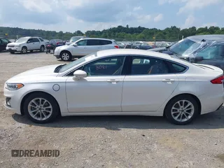 2019 Ford Fusion Titanium with VIN 3FA6P0SU8KR192833, listed as a IAAI auction lot 42818081 with 71,188 mi miles and . Bid and sale history available at DreamBid. Image 14.