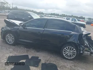 2016 Volkswagen Jetta Sedan 1.8T SEL with VIN 3VWL07AJ9GM258065, listed as a IAAI auction lot 41617182 with 164,891 mi miles. Bid and sale history available at carsss.com. Image 14.