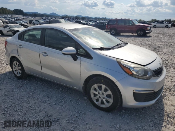 2016 Kia Rio LX with VIN KNADM4A33G6651343, listed as a Copart auction lot 74625764 with 132,401 mi miles and Salvage Title. Bid and sale history available at carsss.com. Image 4.