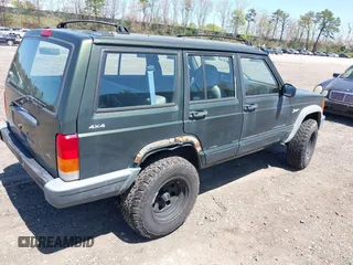 1998 Jeep Cherokee Sport with VIN 1J4FJ68S9WL189992, listed as a IAAI auction lot 42039822 with 156,006 mi miles. Bid and sale history available at carsss.com. Image 4.