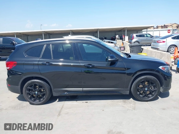 2021 BMW X1 sDrive28i with VIN WBXJG7C07M3M65841, listed as a IAAI auction lot 41877032 with 79,817 mi miles and . Bid and sale history available at DreamBid. Image 13.