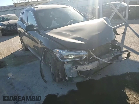 2016 BMW X1 xDrive28i with VIN WBXHT3C36GP880207, listed as a Copart auction lot 82597924 with 145,444 mi miles and Salvage Title. Bid and sale history available at carsss.com. Image 12.