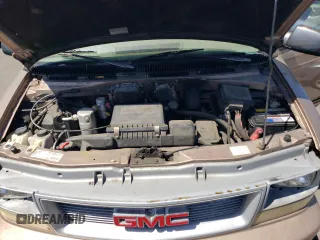 1996 GMC Safari with VIN 1GKDM19W3TB510312, listed as a Copart auction lot 69528134 with 106,226 mi miles and Salvage Title. Bid and sale history available at carsss.com. Image 12.
