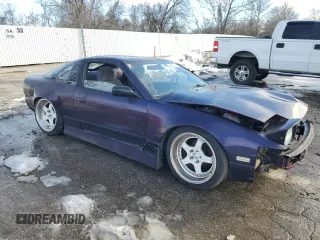 1992 Nissan 240SX SE Limited Edition z VIN JN1MS36P3NW113367, wystawiony jako Copart lot #89062255 z przebiegiem 83 369 mil mil oraz Szkody całkowita. Historia ofert i sprzedaży dostępna na DreamBid. Obrazek 4.