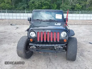 2012 Jeep Wrangler Unlimited Sahara with VIN 1C4HJWEG0CL168300, listed as a IAAI auction lot 42430678 with 70,000 mi miles and . Bid and sale history available at DreamBid. Image 13.