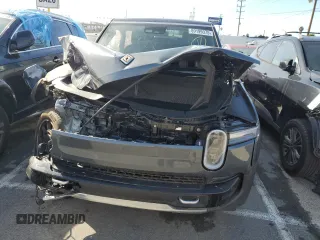 2025 Rivian R1S Adventure z VIN 7PDSGBBA5SN048839, wystawiony jako Copart lot #89199375 z przebiegiem 5177 mil mil oraz Szkody całkowita. Historia ofert i sprzedaży dostępna na DreamBid. Obrazek 5.