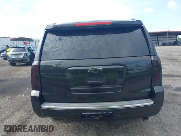 2015 Chevrolet Tahoe LTZ with VIN 1GNSCCKC5FR103676, listed as a IAAI auction lot 42456913 with 214,009 mi miles and . Bid and sale history available at DreamBid. Image 15.