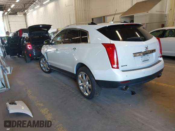 2013 Cadillac SRX Premium Collection с VIN 3GYFNEE33DS574080, выставлен на аукционе IAAI как лот 42166048 с пробегом 109 393 миль миль и . История ставок и продаж доступна на DreamBid. Изображение 3.