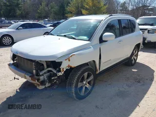 2016 Jeep Compass High Altitude with VIN 1C4NJDEB4GD767731, listed as a IAAI auction lot 41977400 with 99,890 mi miles and . Bid and sale history available at DreamBid. Image 2.