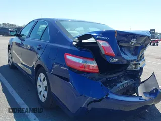 2007 Toyota Camry CE with VIN 4T1BE46K07U090307, listed as a IAAI auction lot 42000642 with 242,517 mi miles and . Bid and sale history available at DreamBid. Image 3.