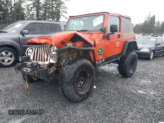 2006 Jeep Wrangler SE with VIN 1J4FA29S46P738370, listed as a IAAI auction lot 41825273 with 163,267 mi miles. Bid and sale history available at carsss.com. Image 2.