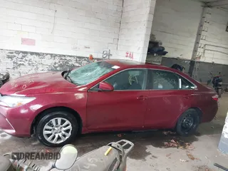 2015 Toyota Camry XLE with VIN 4T1BF1FK8FU932854, listed as a IAAI auction lot 41872099 with Not Provided miles and . Bid and sale history available at DreamBid. Image 13.