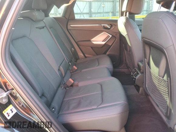 2024 Audi Q3 S line Premium z VIN WA1DECF32R1023321, wystawiony jako Copart lot #51187225 z przebiegiem 13 299 mil mil oraz Nie do naprawy. Historia ofert i sprzedaży dostępna na DreamBid. Obrazek 12.