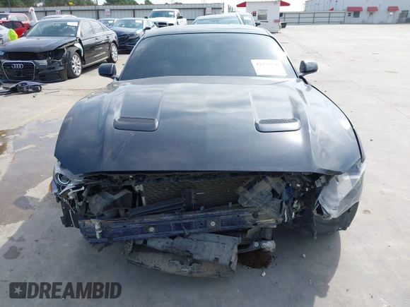 2018 Ford Mustang GT z VIN 1FA6P8CF7J5163016, wystawiony jako IAAI lot #42231330 z przebiegiem 55 810 mil mil oraz . Historia ofert i sprzedaży dostępna na DreamBid. Obrazek 13.