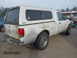 2000 Mazda B-Series 2WD Truck SX with VIN 4F4YR12C4YTM29858, listed as a IAAI auction lot 41473810 with 261,518 mi miles. Bid and sale history available at carsss.com. Image 4.