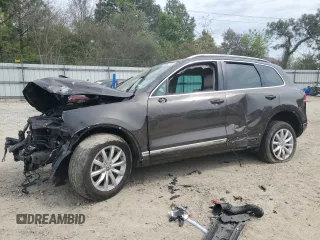 2016 Volkswagen Touareg Sport с VIN WVGEF9BP3GD013102, выставлен на аукционе Copart как лот 53333375 с пробегом Не указан миль и Списание • Salvage title. История ставок и продаж доступна на DreamBid. Изображение 1.