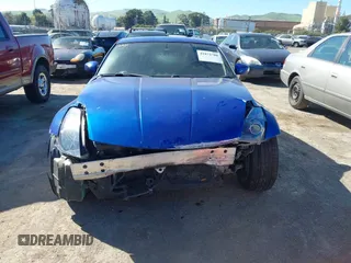 2004 Nissan 350Z Touring with VIN JN1AZ34D34T165329, listed as a IAAI auction lot 41872788 with 199,196 mi miles. Bid and sale history available at carsss.com. Image 6.