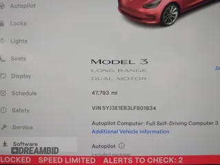 2020 Tesla Model 3 Long Range with VIN 5YJ3E1EB3LF801834, listed as a IAAI auction lot 42015079 with 47,793 mi miles. Bid and sale history available at carsss.com. Image 7.