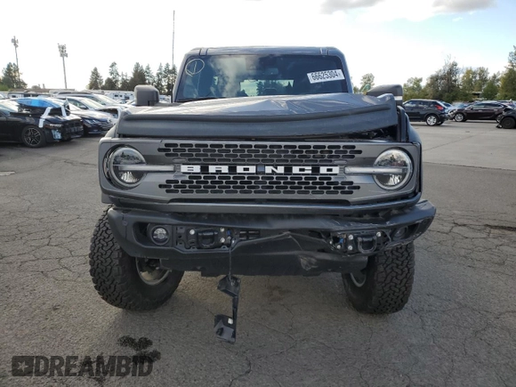 2023 Ford Bronco with VIN 1FMDE5CP1PLA92944, listed as a Copart auction lot 66625304 with 115,179 mi miles and Salvage title. Bid and sale history available at DreamBid. Image 5.