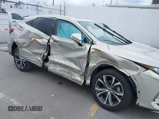 2020 Lexus RX with VIN 2T2HZMAA0LC166189, listed as a IAAI auction lot 41778489 with 49,408 mi miles. Bid and sale history available at carsss.com. Image 6.