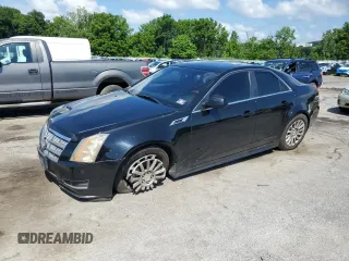 2011 Cadillac CTS Luxury z VIN 1G6DH5EY7B0156970, wystawiony jako Copart lot #64486515 z przebiegiem Nie podano mil oraz Szkoda całkowita • Salvage title. Historia ofert i sprzedaży dostępna na DreamBid. Obrazek 1.