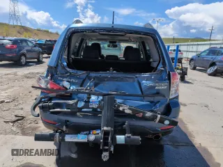 2011 Subaru Forester X Limited with VIN JF2SHAEC7BH739950, listed as a Copart auction lot 54569515 with 115,238 mi miles and Salvage title. Bid and sale history available at DreamBid. Image 6.
