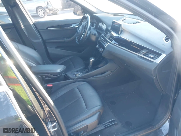 2019 BMW X1 sDrive28i with VIN WBXHU7C52K5L11560, listed as a IAAI auction lot 41354422 with 115,401 mi miles. Bid and sale history available at carsss.com. Image 5.