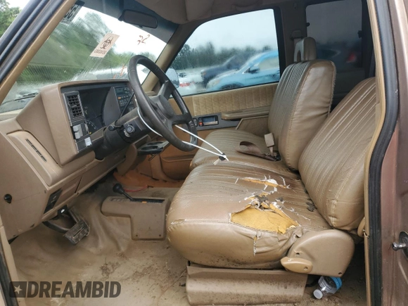 1994 GMC Sierra 1500 z VIN 2GTEK19K3R1574913, wystawiony jako Copart lot #55939635 z przebiegiem 191 240 mil mil oraz Szkoda całkowita • Salvage title. Historia ofert i sprzedaży dostępna na DreamBid. Obrazek 7.