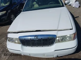2002 Mercury Grand Marquis LS Premium z VIN 2MEFM75W92X641347, wystawiony jako IAAI lot #41701179 z przebiegiem 79 942 mil mil oraz . Historia ofert i sprzedaży dostępna na DreamBid. Obrazek 12.