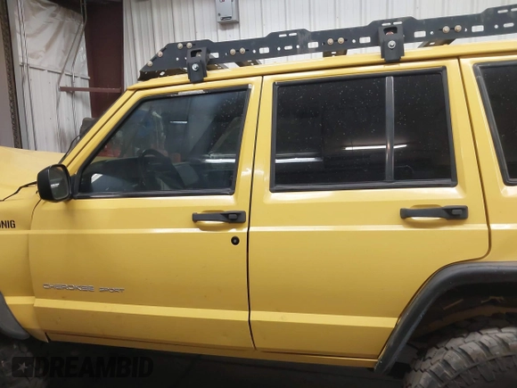 2001 Jeep Cherokee Sport with VIN 1J4FF48S41L580319, listed as a IAAI auction lot 42064564 with 257,534 mi miles and . Bid and sale history available at DreamBid. Image 14.