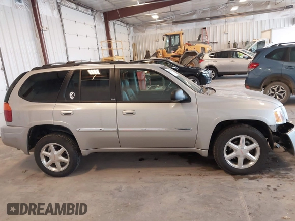 2007 GMC Envoy SLE z VIN 1GKDT13S572152757, wystawiony jako IAAI lot #42095239 z przebiegiem 50 510 mil mil oraz . Historia ofert i sprzedaży dostępna na DreamBid. Obrazek 13.