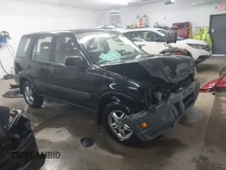 2000 Honda CR-V EX with VIN JHLRD1865YS007202, listed as a IAAI auction lot 41801108 with 134,387 mi miles. Bid and sale history available at carsss.com. Image 1.