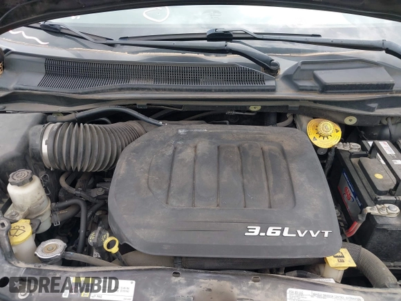 2016 Chrysler Town & Country Touring with VIN 2C4RC1BG7GR287707, listed as a IAAI auction lot 42136625 with 86,684 mi miles and . Bid and sale history available at DreamBid. Image 10.