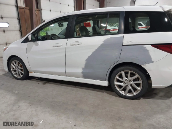 2012 Mazda Mazda5 Grand Touring with VIN JM1CW2DL9C0100114, listed as a IAAI auction lot 42038998 with 160,651 mi miles. Bid and sale history available at carsss.com. Image 6.