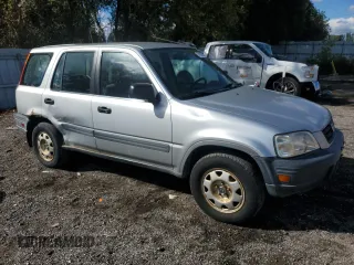1999 Honda CR-V LX with VIN JHLRD1842XC800979, listed as a Copart auction lot 74209994 with 341,957 mi miles and Clean Title. Bid and sale history available at carsss.com. Image 4.