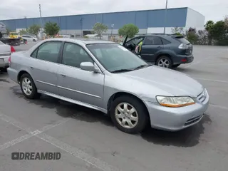 2002 Honda Accord SE z VIN JHMCG66882C017332, wystawiony jako IAAI lot #42033213 z przebiegiem 215 213 mil mil oraz . Historia ofert i sprzedaży dostępna na DreamBid. Obrazek 1.
