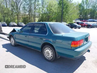 1993 Honda Accord LX with VIN 1HGCB7553PA066813, listed as a IAAI auction lot 41958935 with 454,394 mi miles. Bid and sale history available at carsss.com. Image 3.
