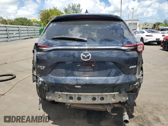 2018 Mazda CX-9 Touring with VIN JM3TCBCY3J0235048, listed as a Copart auction lot 61043915 with 82,869 mi miles and Salvage title. Bid and sale history available at DreamBid. Image 6.