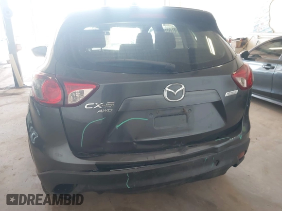 2014 Mazda CX-5 Sport with VIN JM3KE4BE5E0375360, listed as a IAAI auction lot 41788977 with 135,487 mi miles. Bid and sale history available at carsss.com. Image 16.