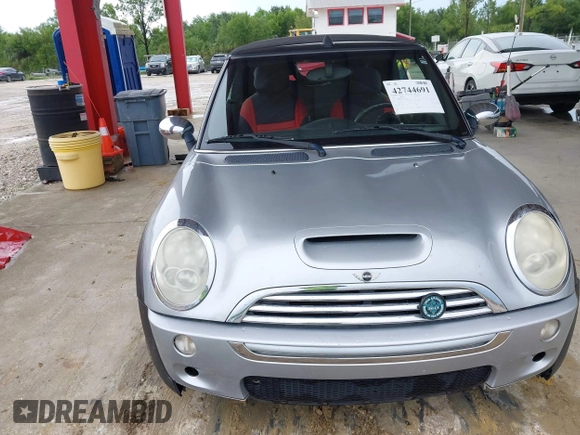 2006 MINI Convertible S with VIN WMWRH33556TL93023, listed as a IAAI auction lot 42744691 with 128,192 mi miles and . Bid and sale history available at DreamBid. Image 6.