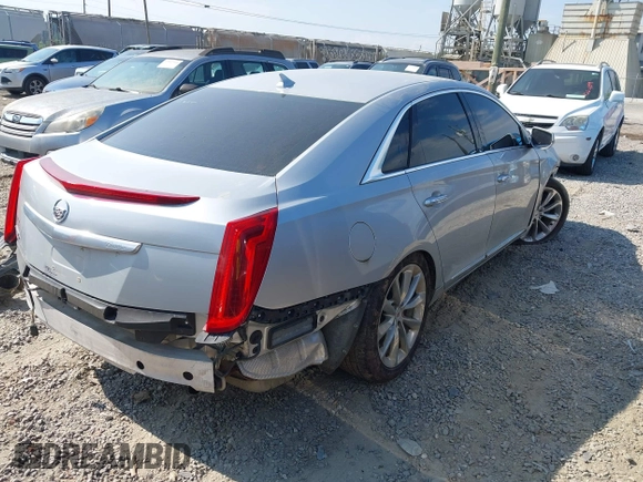 2013 Cadillac XTS Luxury z VIN 2G61R5S38D9228339, wystawiony jako IAAI lot #42664948 z przebiegiem 105 917 mil mil oraz . Historia ofert i sprzedaży dostępna na DreamBid. Obrazek 4.