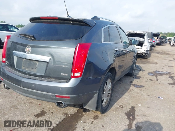 2012 Cadillac SRX Luxury Collection z VIN 3GYFNAE39CS659562, wystawiony jako IAAI lot #42109525 z przebiegiem 151 051 mil mil oraz . Historia ofert i sprzedaży dostępna na DreamBid. Obrazek 4.