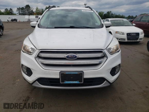 2018 Ford Escape SE z VIN 1FMCU9GDXJUA71940, wystawiony jako Copart lot #55891775 z przebiegiem 117 298 mil mil oraz Tytuł czysty. Historia ofert i sprzedaży dostępna na DreamBid. Obrazek 5.