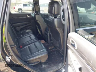 2016 Jeep Grand Cherokee Overland with VIN 1C4RJFCG5GC343752, listed as a IAAI auction lot 42138080 with 86,777 mi miles and . Bid and sale history available at DreamBid. Image 8.