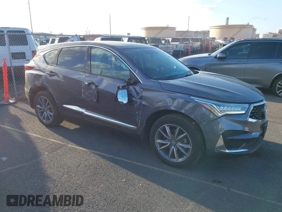 2021 Acura RDX Technology with VIN 5J8TC1H55ML018431, listed as a IAAI auction lot 41719700 with 12,767 mi miles and . Bid and sale history available at DreamBid. Image 1.